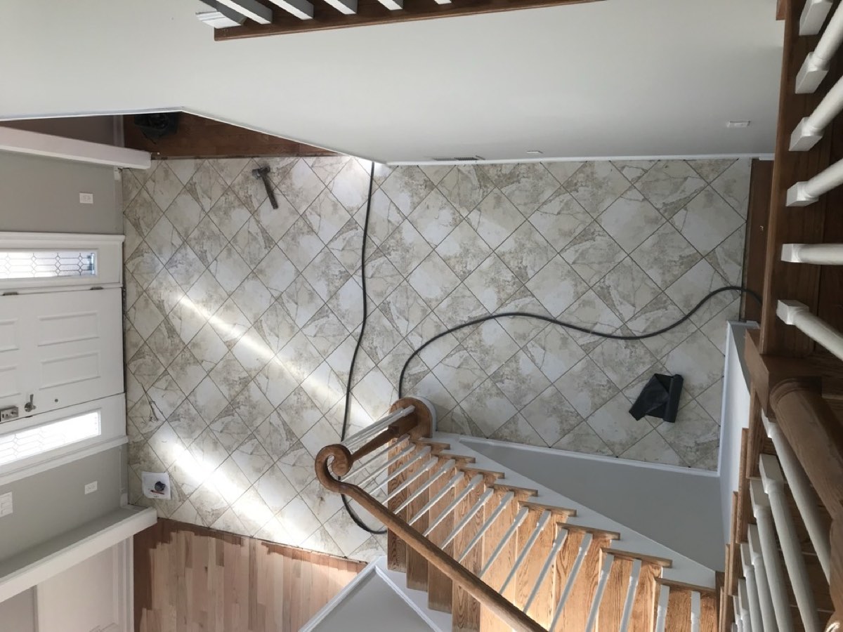 Before &mdash; dated tile foyer