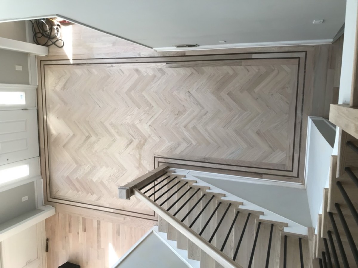 Finished &mdash; white-oak herringbone with walnut border
